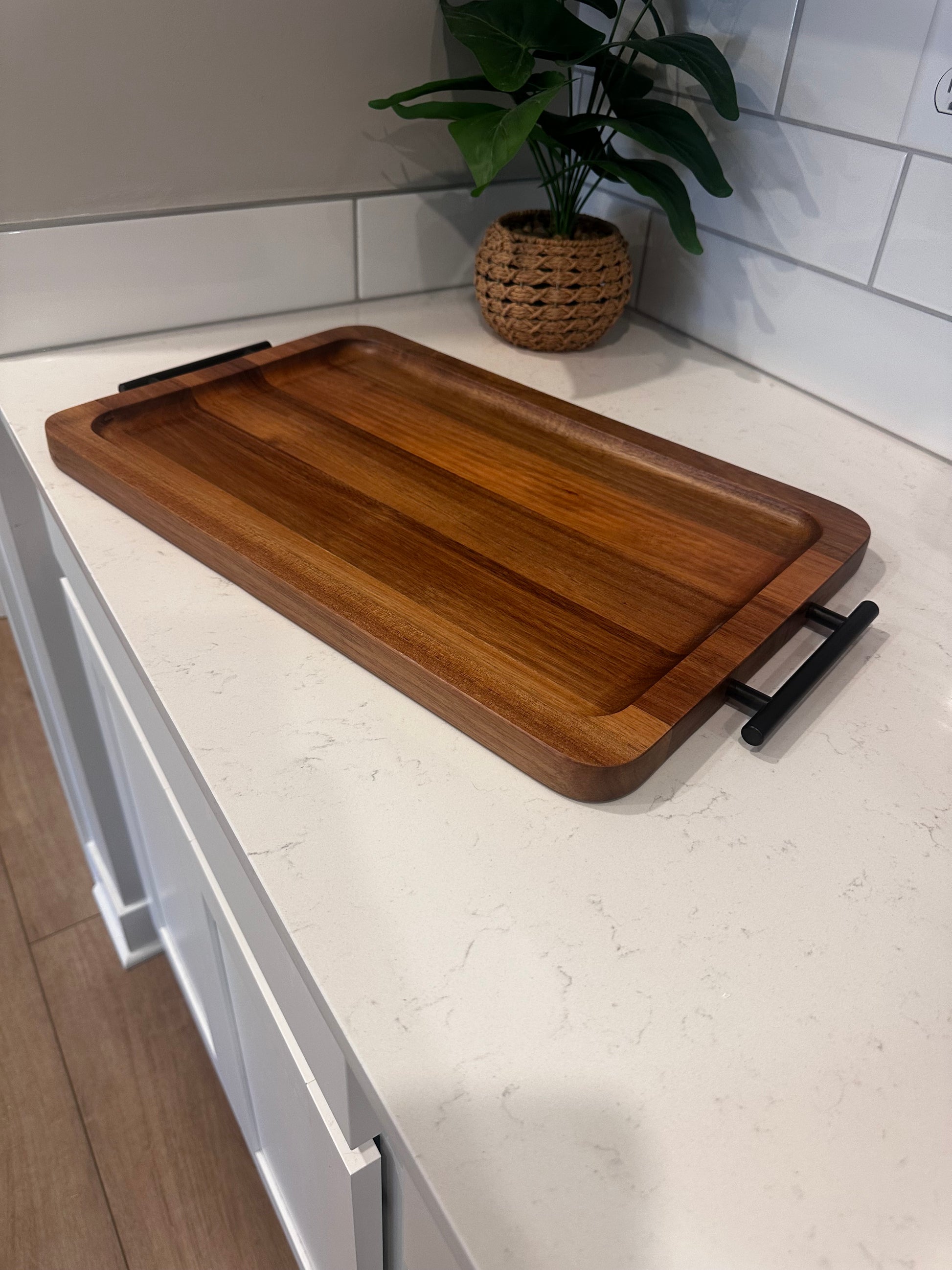 Wooden tray on a white surface