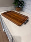 Wooden tray on a white surface